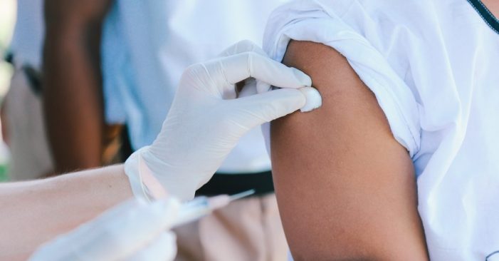 This Other Vaccine Could Already Be Protecting You From COVID, Study Says