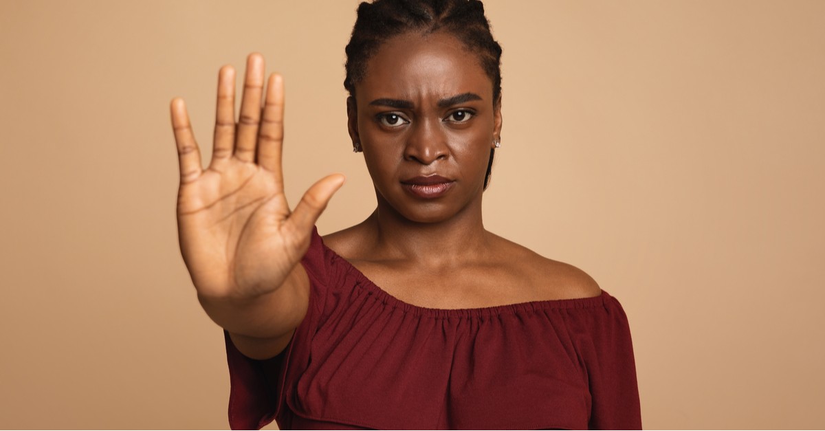 Young angry african american woman in casual outfit making the hand stop sign-img