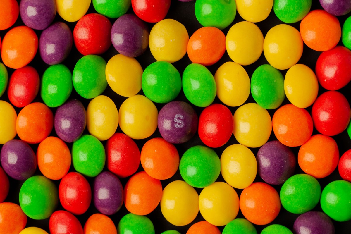 Colorful skittles candies close up-img