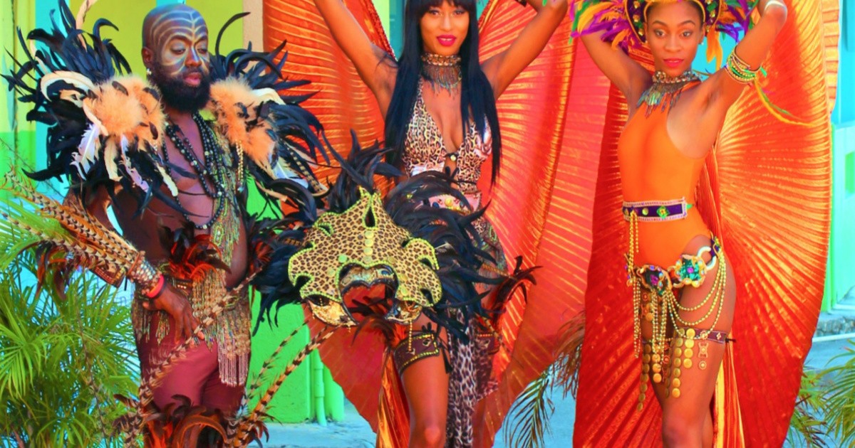 carnival costumes, entertaining tourists in the port of St Johns, Antigua-img