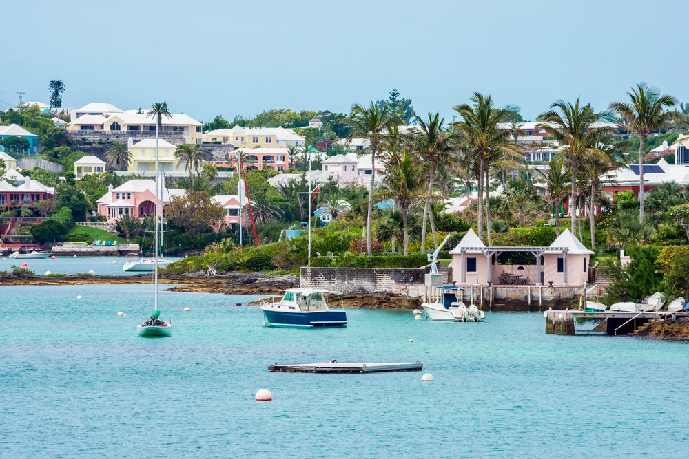 Boats and colorful architecture along the shoreline in Hamilton Bermuda-img