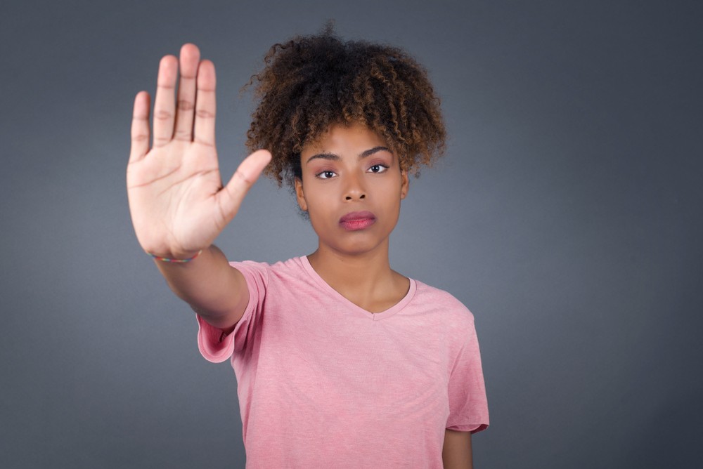 Young beautiful African American woman doing stop gesture-img
