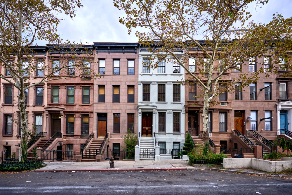 A,View,Of,A,Row,Of,Historic,Brownstones,In,An