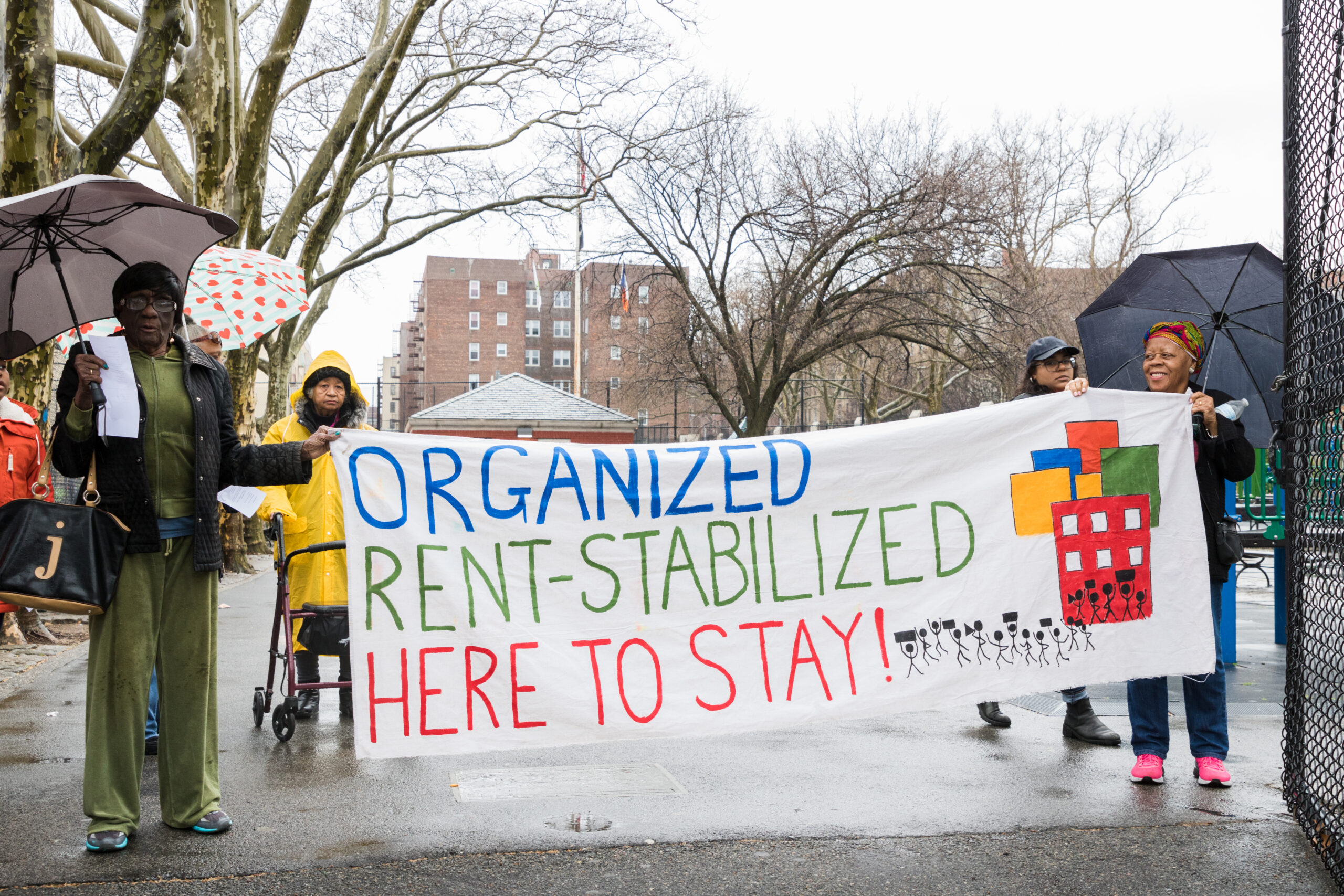 About a dozen Brooklyn tenants marched in the rain to demand their building manager and landlord address needed repairs in their buildings.