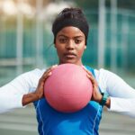 Black girl holding a ball