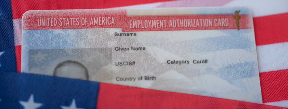 Employment,Authorization,Card,On,Usa,Flag,Surface.,Close,Up,View.