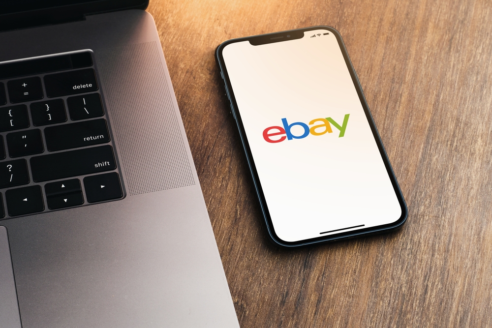 Ebay,App,On,The,Smartphone,Screen,On,Wooden,Background,With