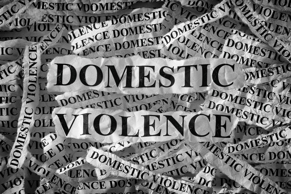 Domestic,Violence.,Torn,Pieces,Of,Paper,With,The,Words,Domestic