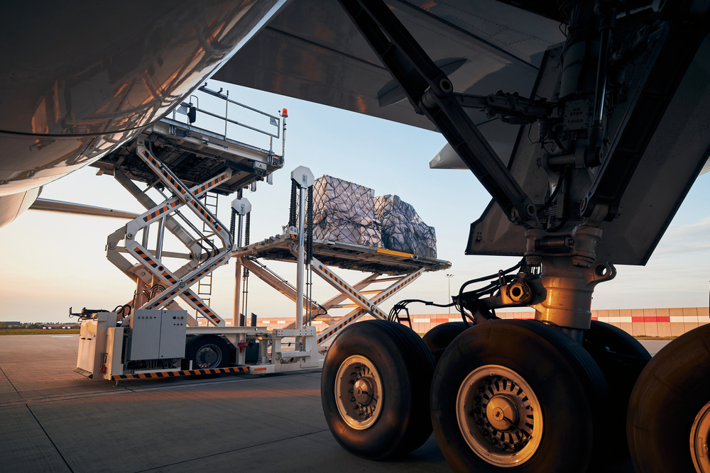 Loading,Of,Cargo,Containers,To,Plane,At,Airport.,Ground,Handling