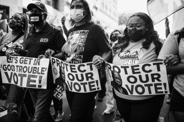 Voter Suppression: Every Voter Card is Covered with Blood