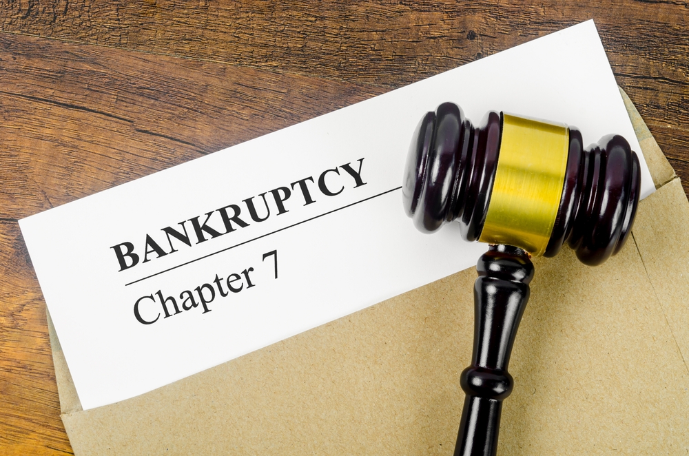 Bankcrupty,Chapter,7,Text,On,Document,Form,And,Wooden,Gavel Bankcrupty,Chapter,7,Text,On,Document,Form,And,Wooden,Gavel