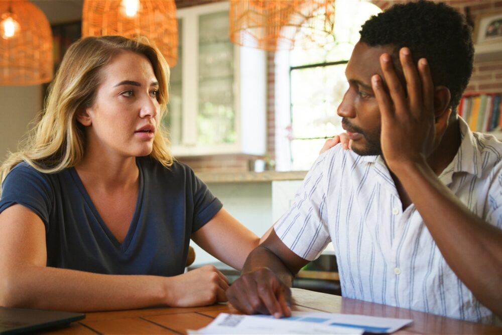 Couple,At,Home,Worried,About,Debt,Bills,And,Rising,Cost Couple,At,Home,Worried,About,Debt,Bills,And,Rising,Cost
